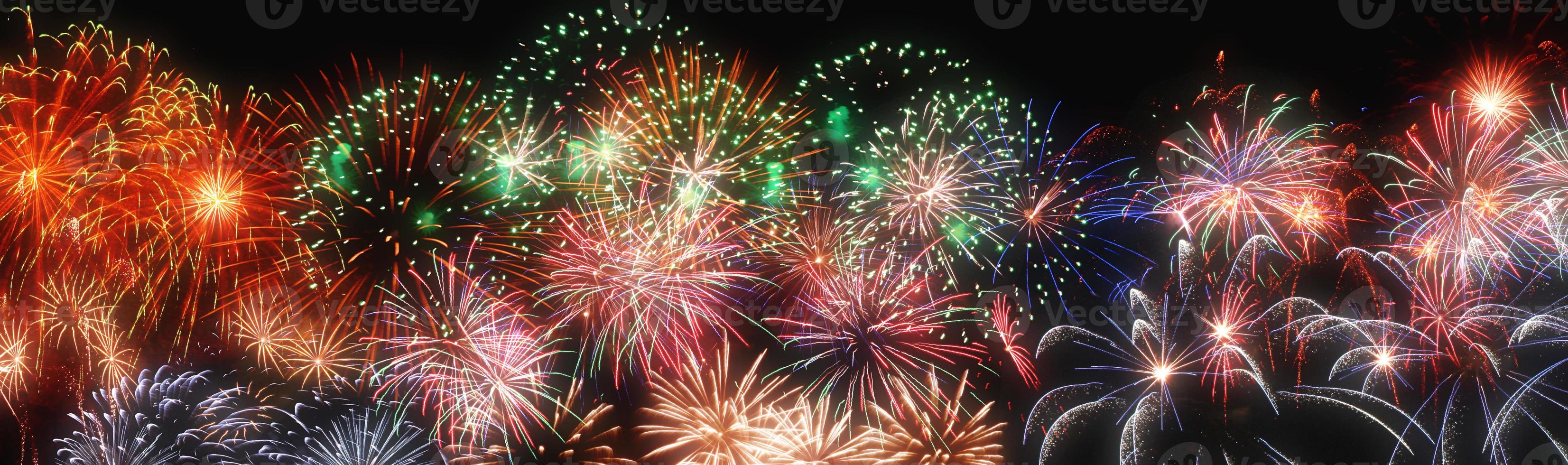 Abstract colored firework on dark sky. Celebration and anniversary concept photo