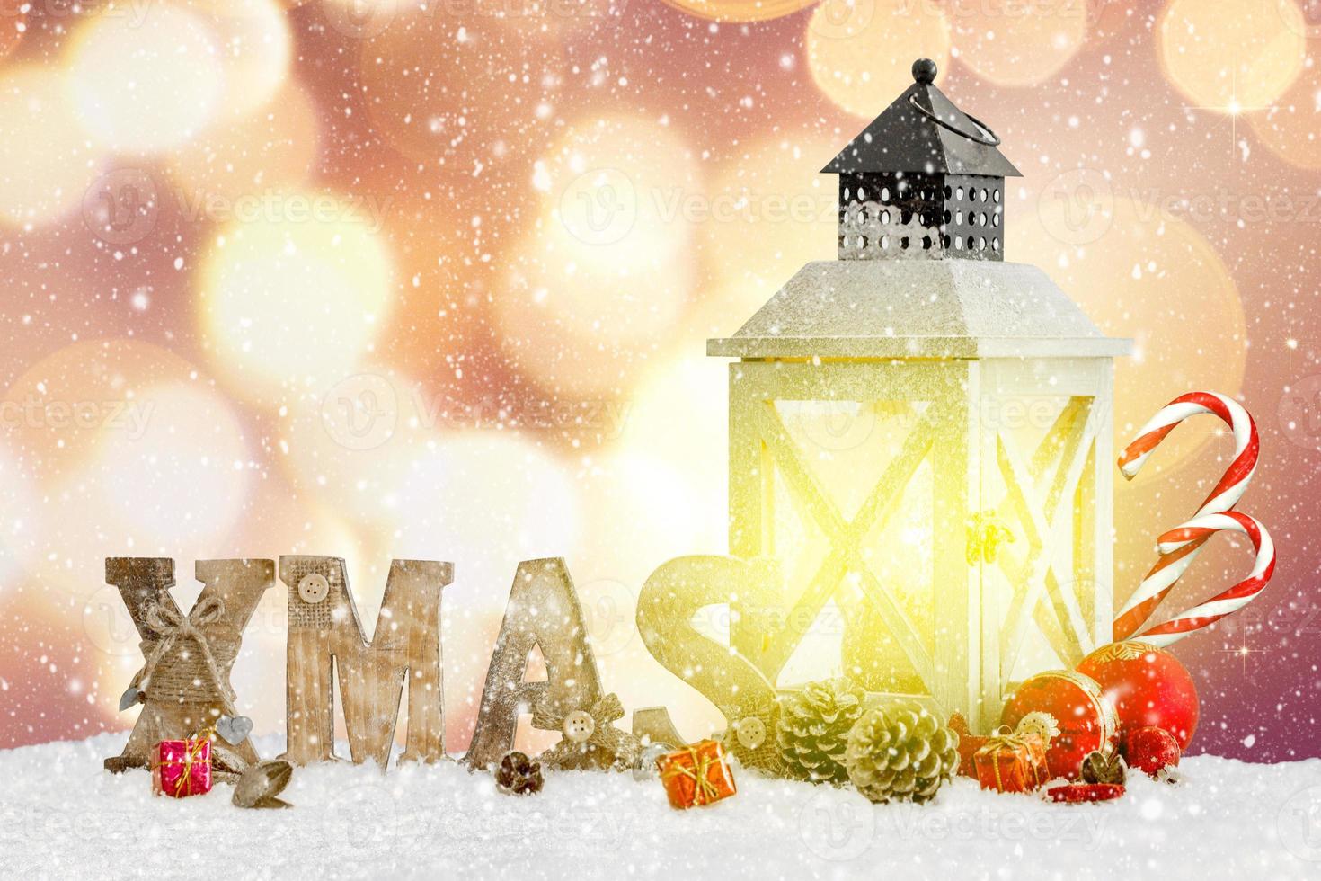 Winter background of snowed lantern and Christmas decoration. photo