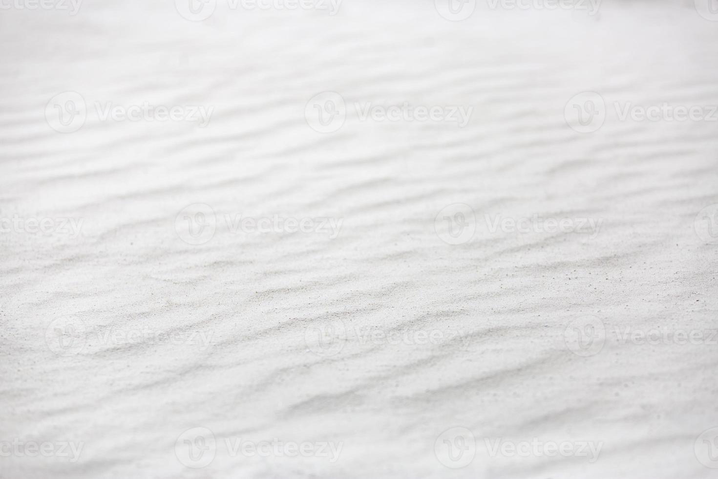 Sand on the the beach as background. Natural sand texture, nature pattern photo