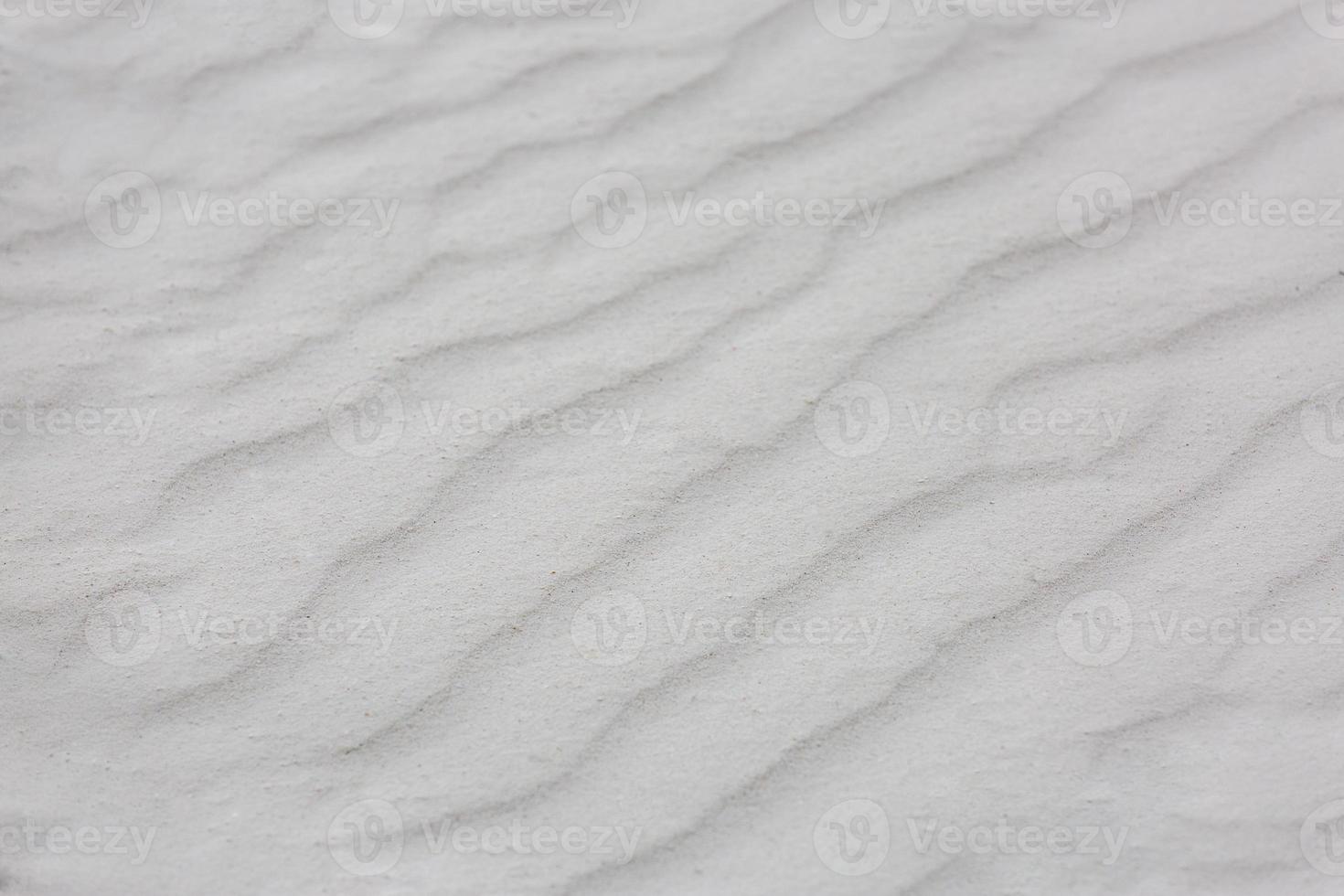 Sand on the the beach as background. Natural sand texture, nature pattern photo
