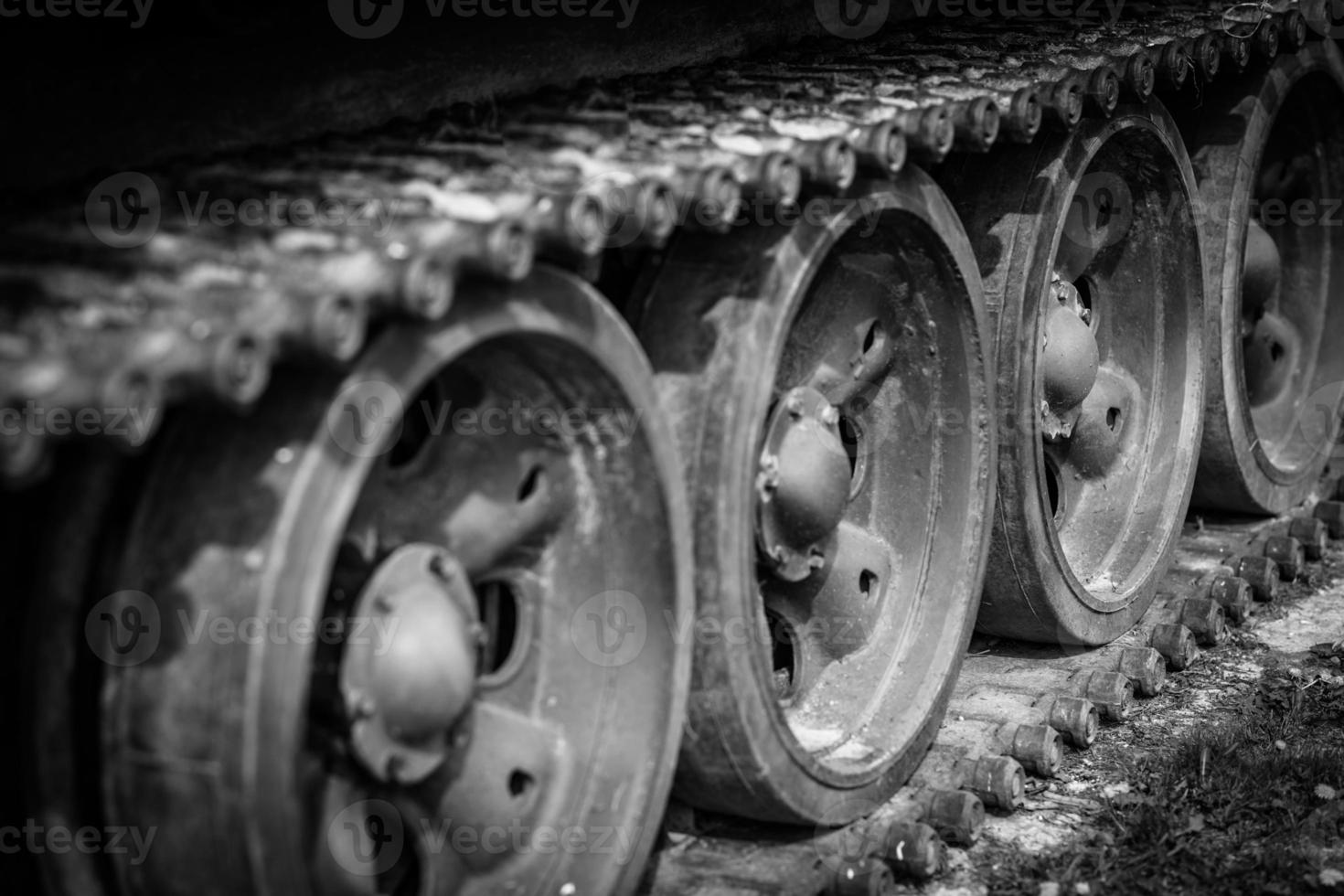 Detail shot with old tank tracks and wheels photo