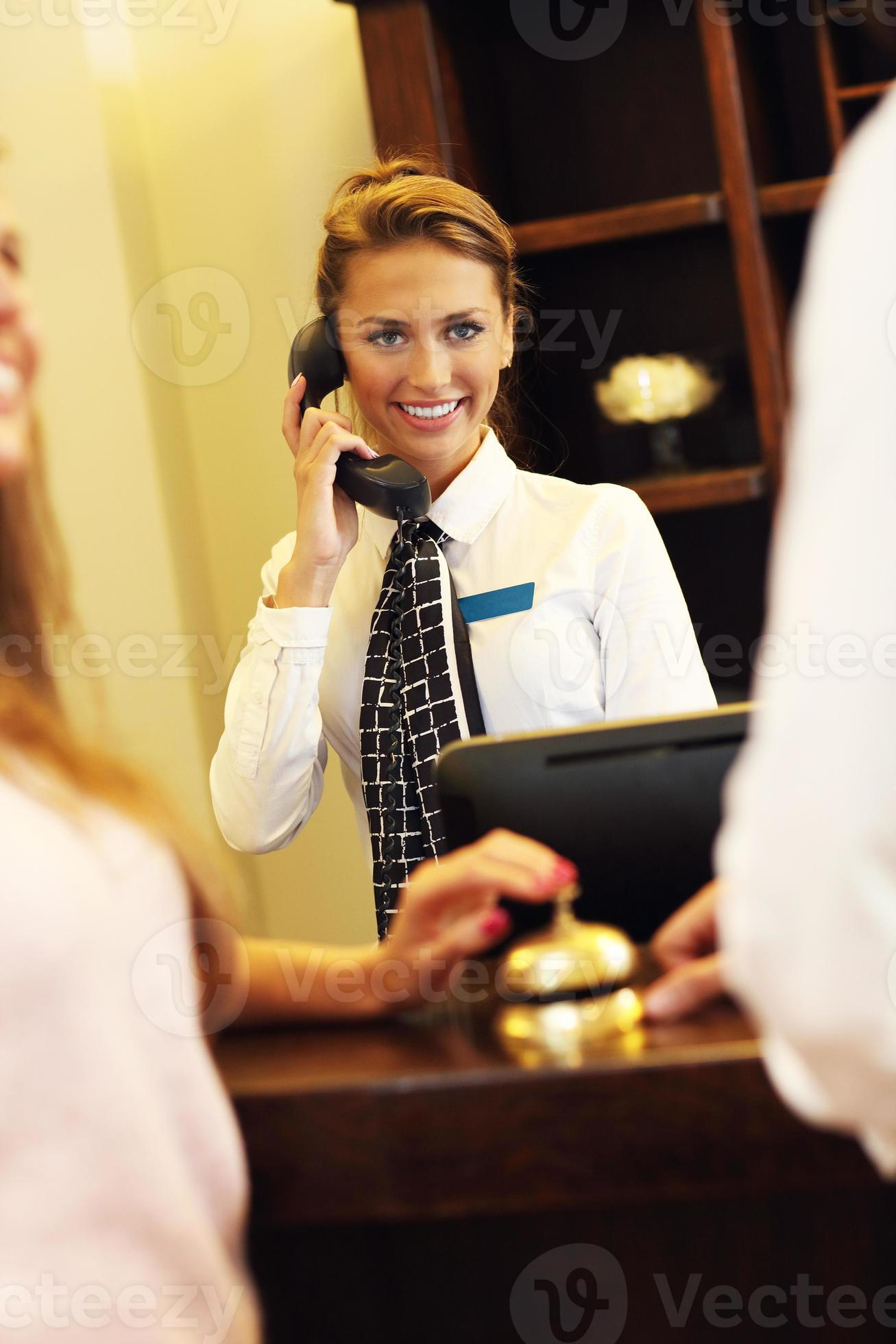 Receptionist in hotel 15886467 Stock Photo at Vecteezy