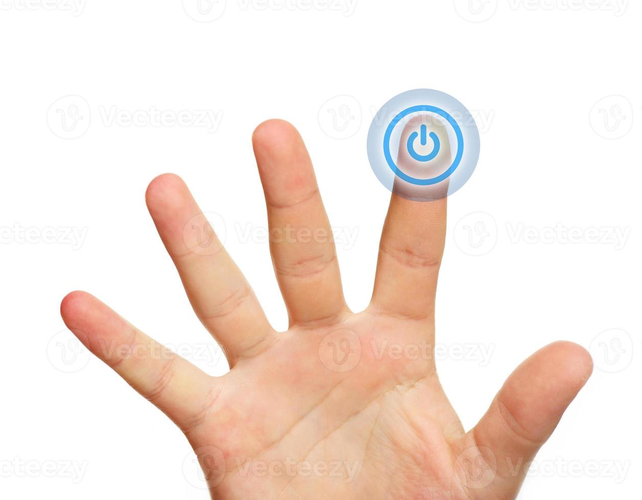 Male hand touching power button photo