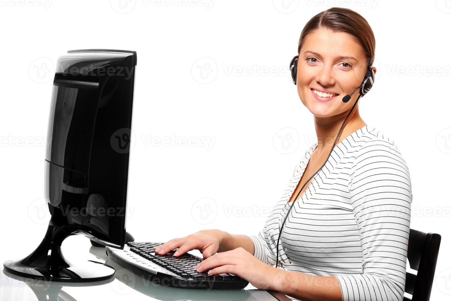 Pretty woman in a call center photo