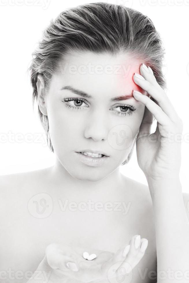 Woman suffering from migraine photo