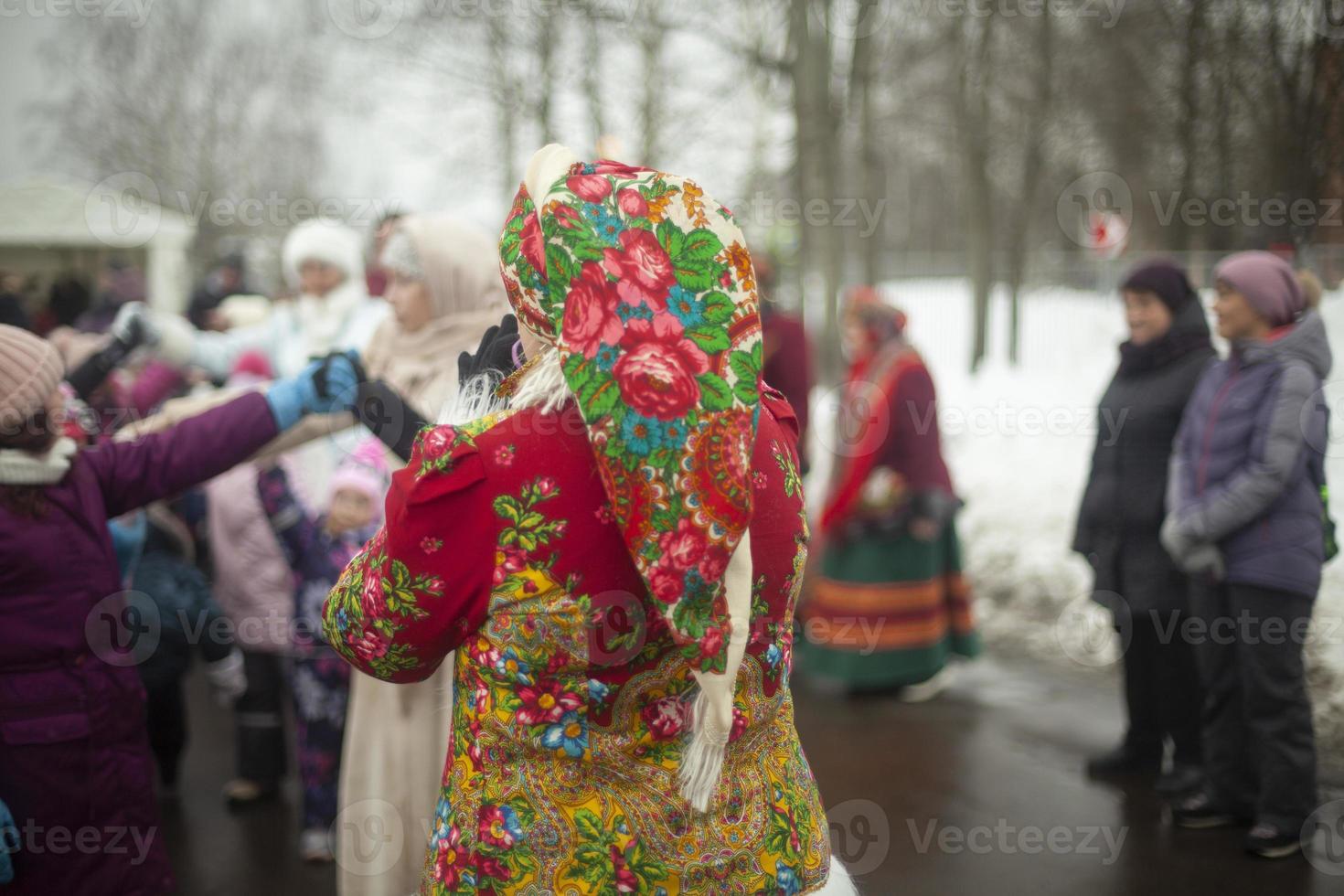 Folk costume. Party on street. Old-fashioned clothes. photo