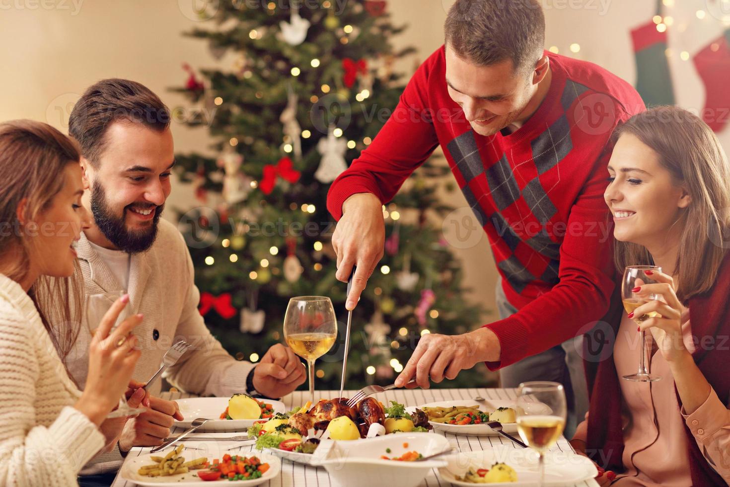 Group of friends celebrating Christmas photo