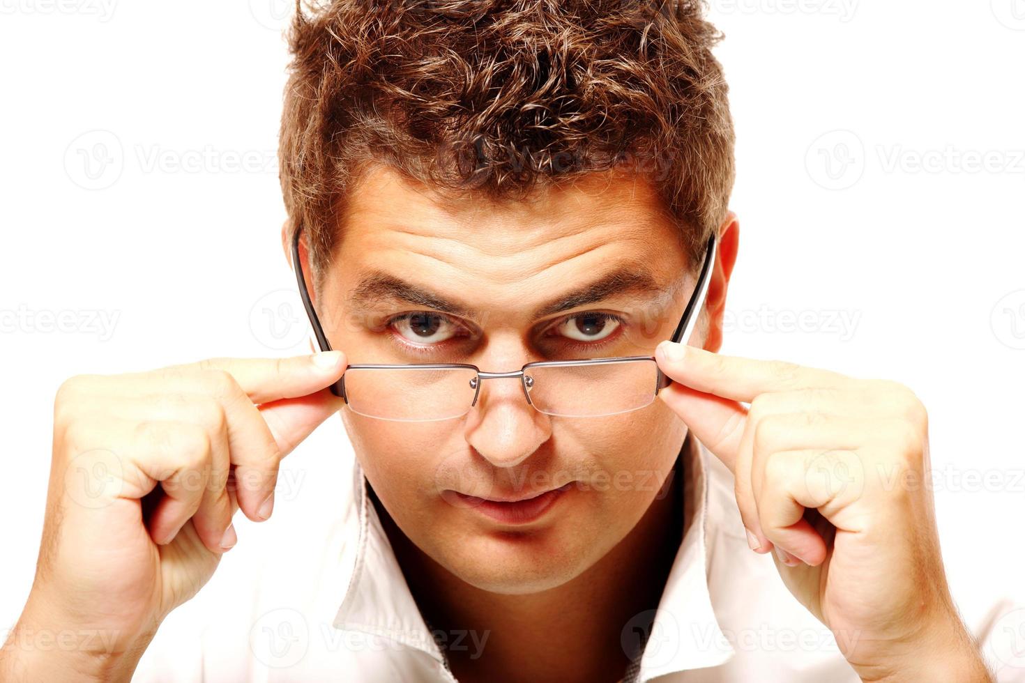 Portrait of a young businessman with glasses photo