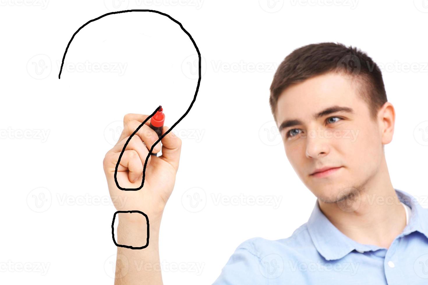 Young Man drawing question mark photo