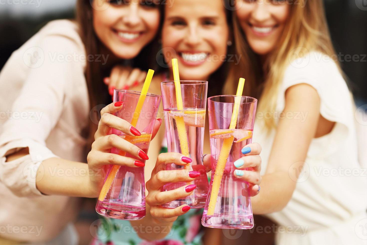 Group of friends with drinks photo