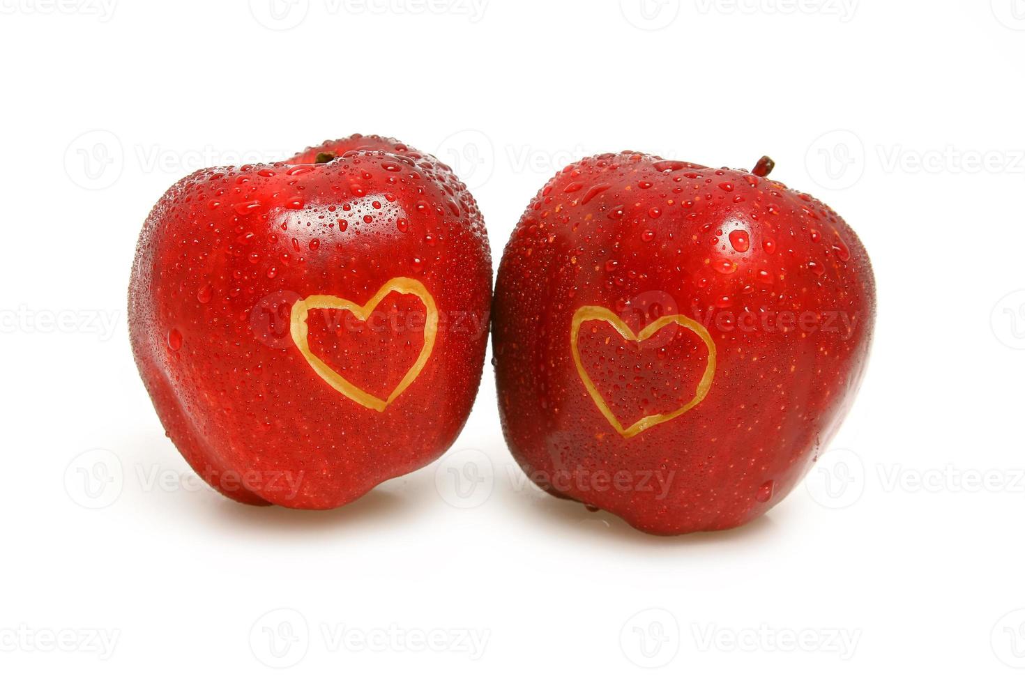 two apples with hearts photo