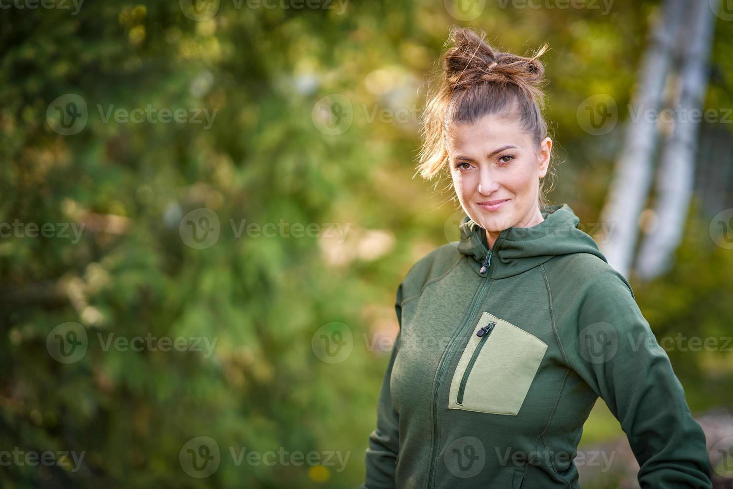 Picture of woman working with tools in the garden photo