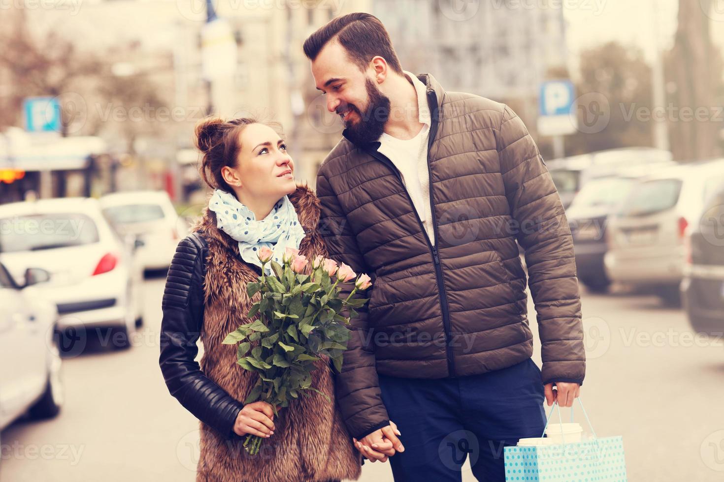 Romantic couple with flowers photo