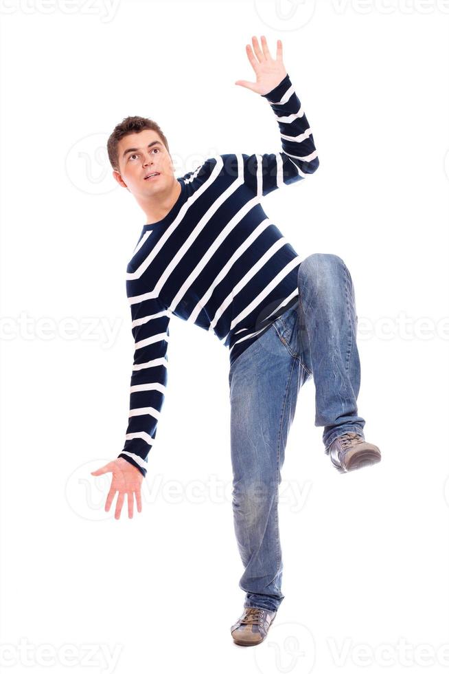 Young man dancing photo