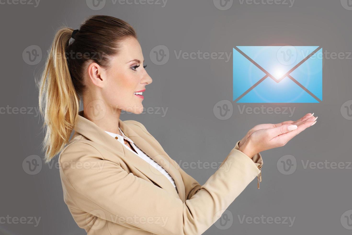 Businesswoman and email sign photo