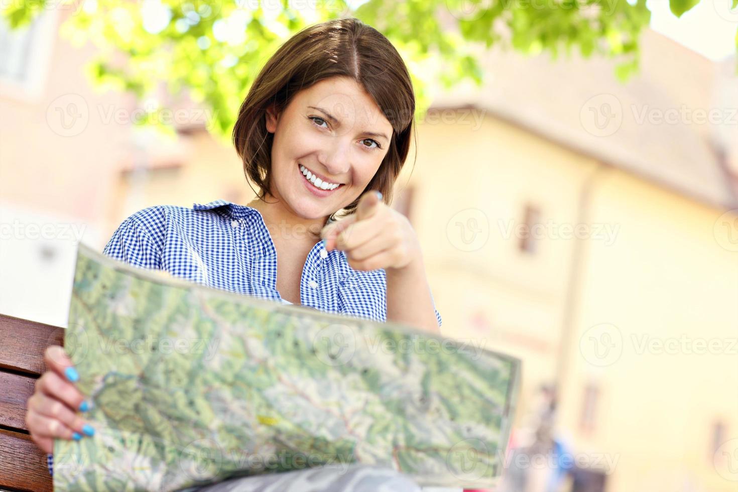 Tourist with map photo