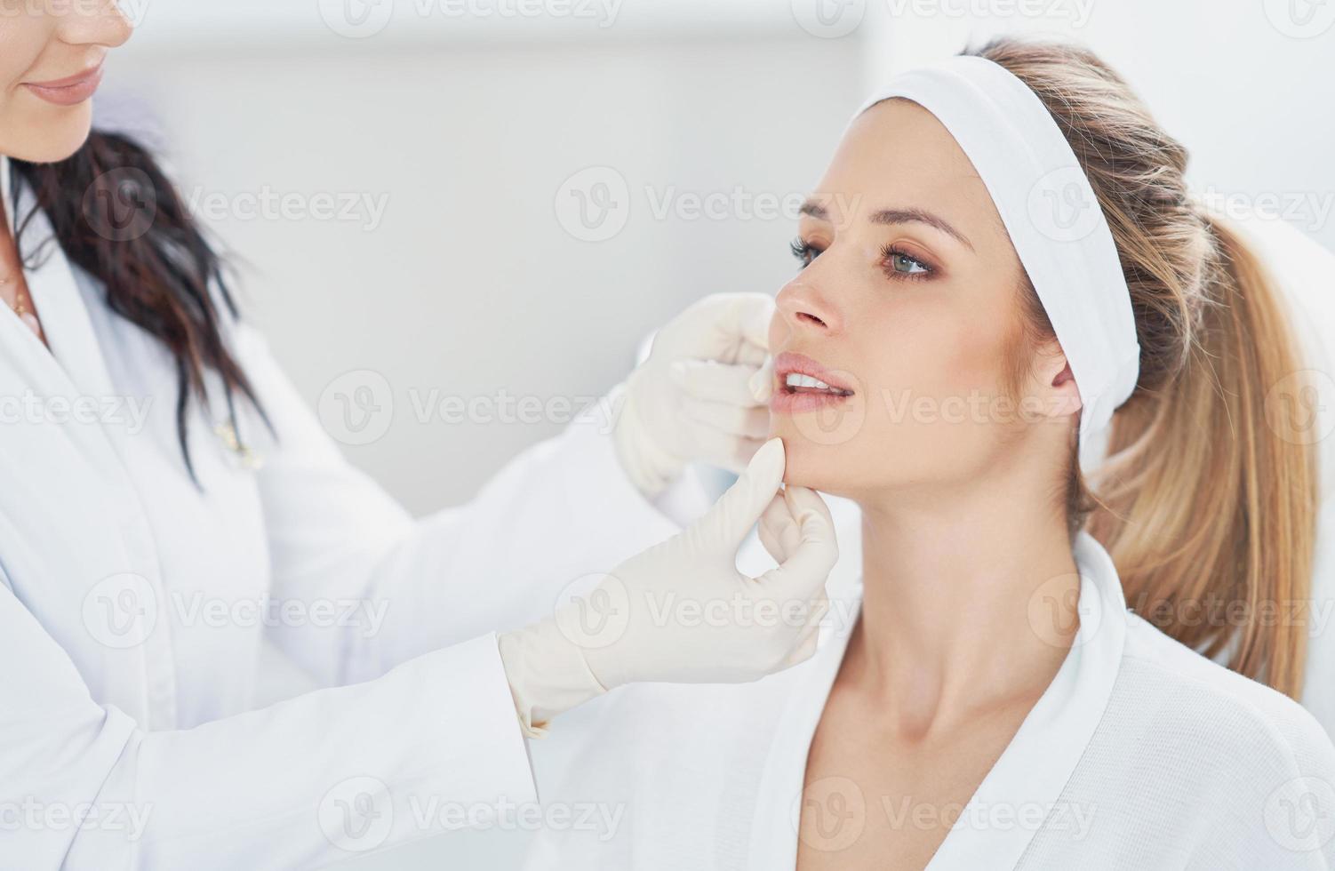 A scene of medical cosmetology treatments botox injection. photo