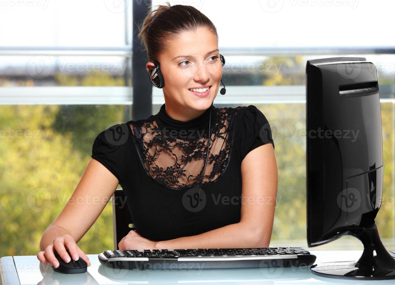 Pretty woman working in the office photo