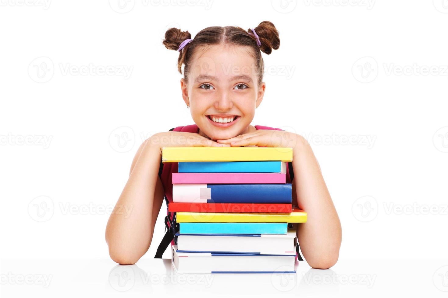 Schoolgirl with books photo