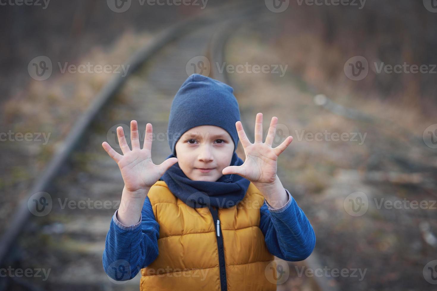 Picture of a child with a lot of love and peaceful message photo