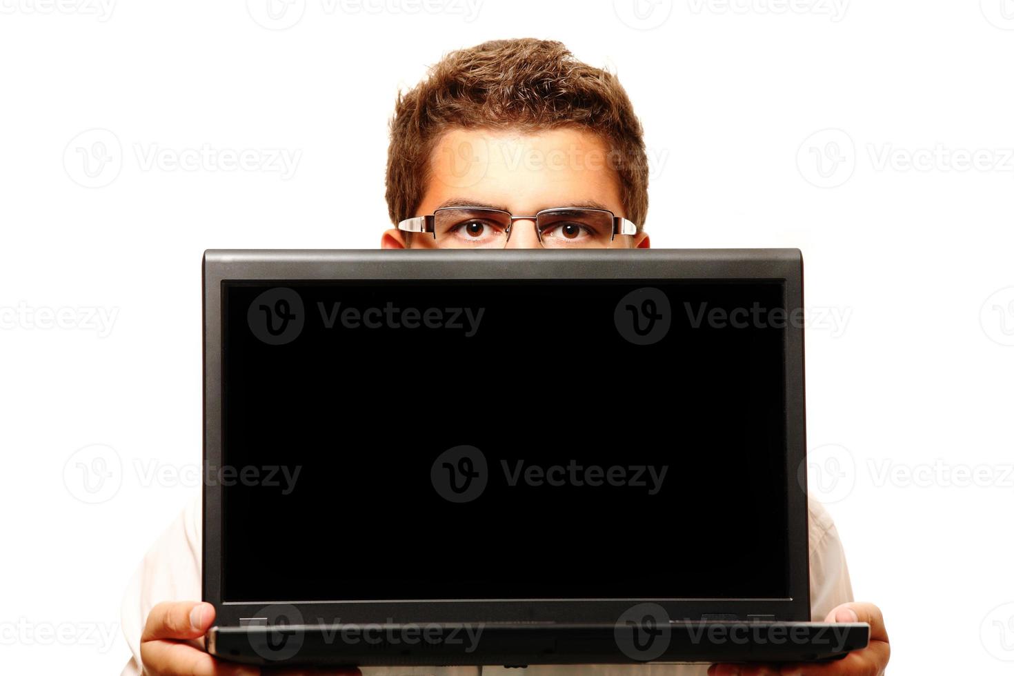 empresario sosteniendo una computadora foto