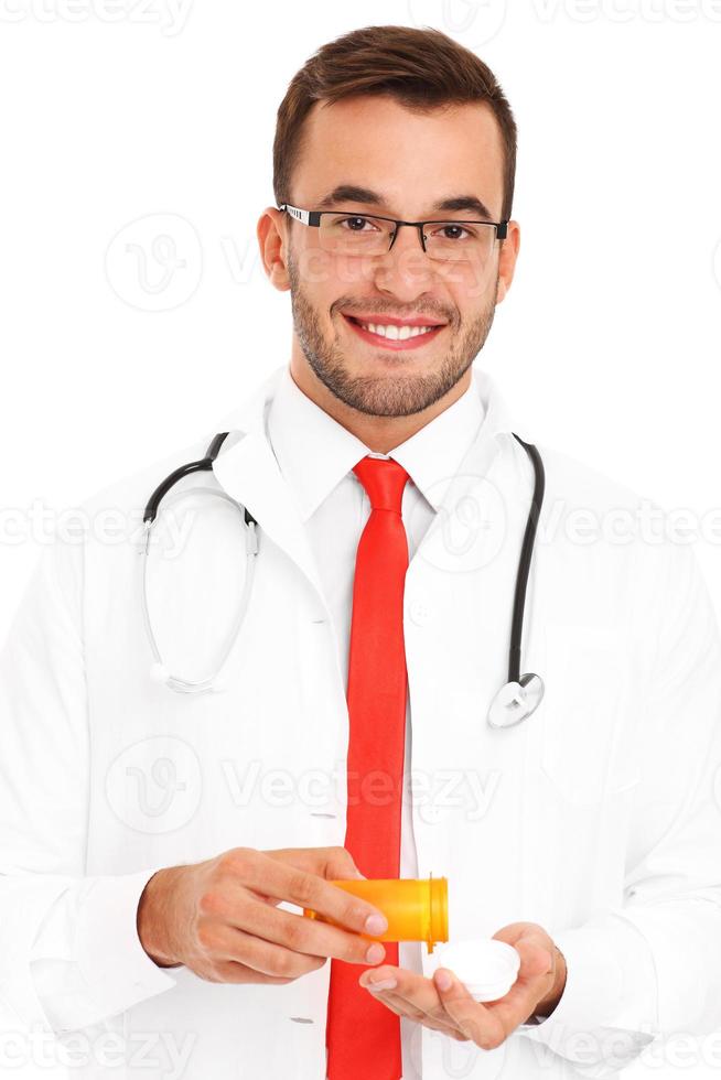 Doctor with pills photo