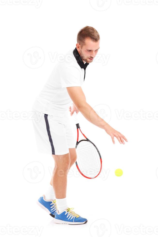 Tennis player with racket and ball photo