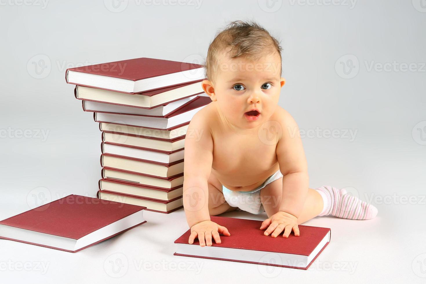 small baby and books photo