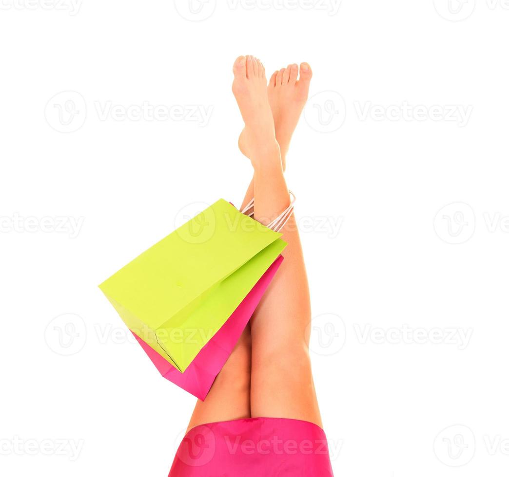 Female legs with shopping bags photo