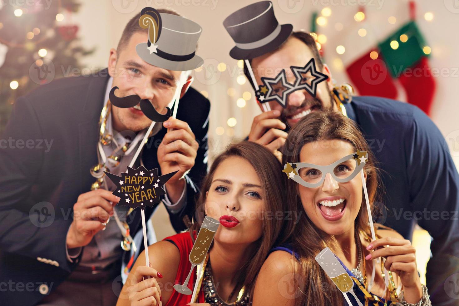Group of friends celebrating New Year photo