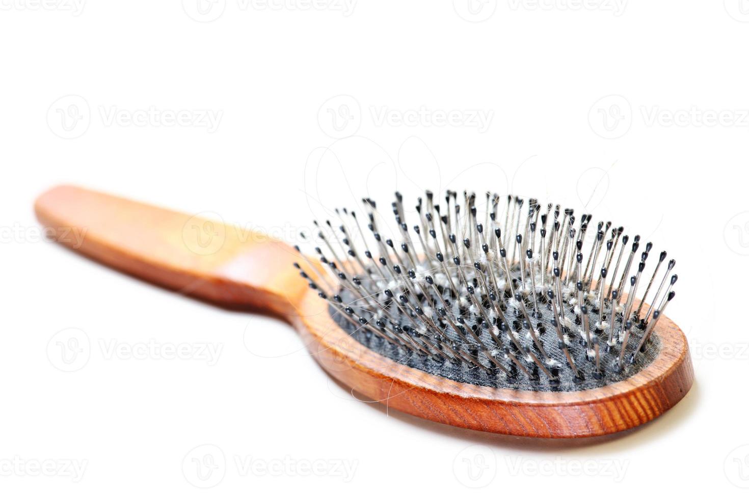 Hairbrush over white photo