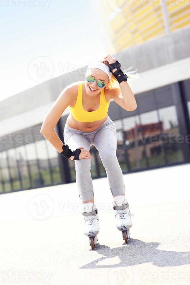 Joyful roller blader in the city photo