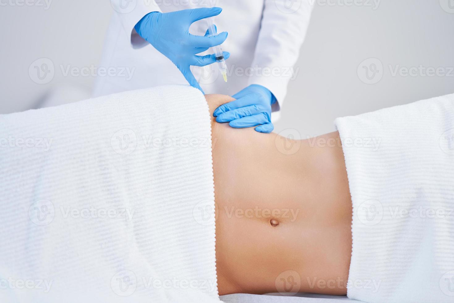 Picture of lipolysis treatment on different parts of woman body photo