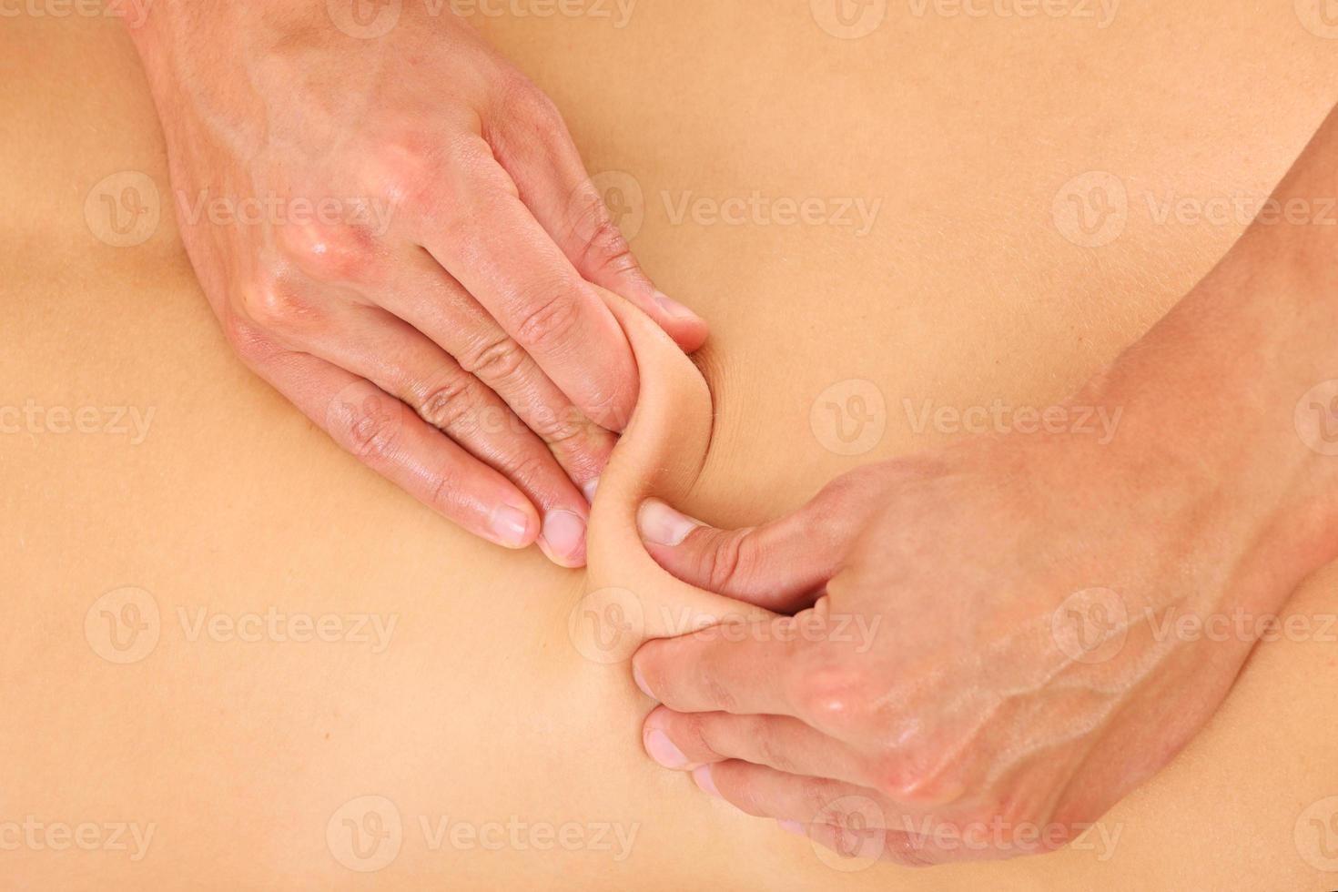Back massage close-up photo