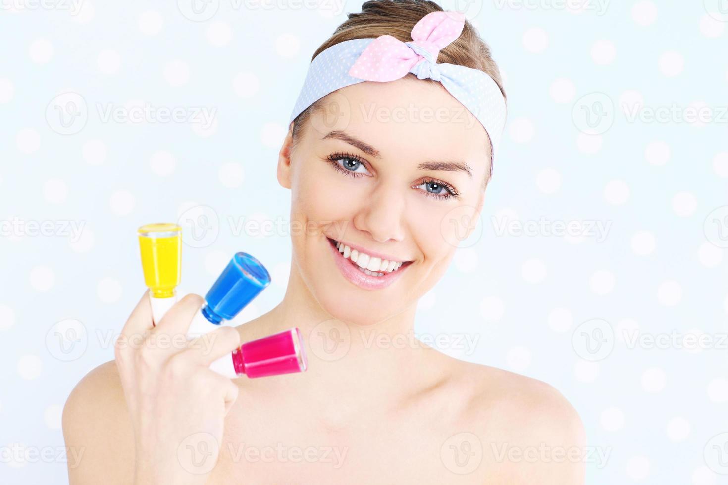 Woman with nail polish photo