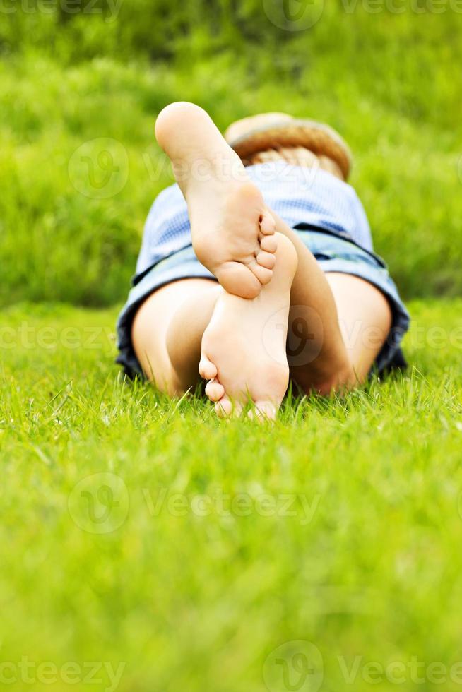 Woman lying on grass photo