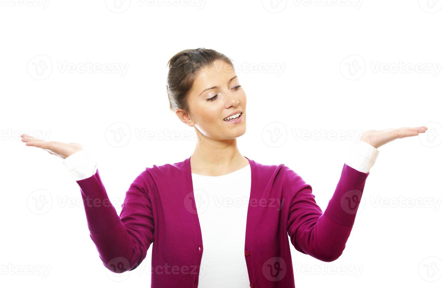 Young woman with arms raised up photo