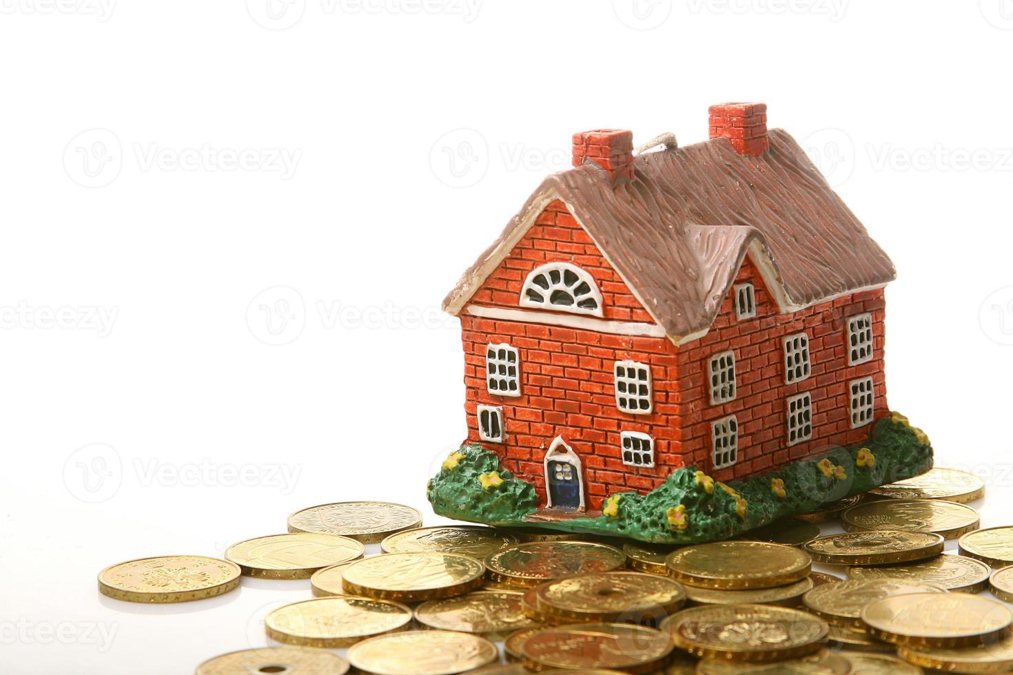 house and coins photo