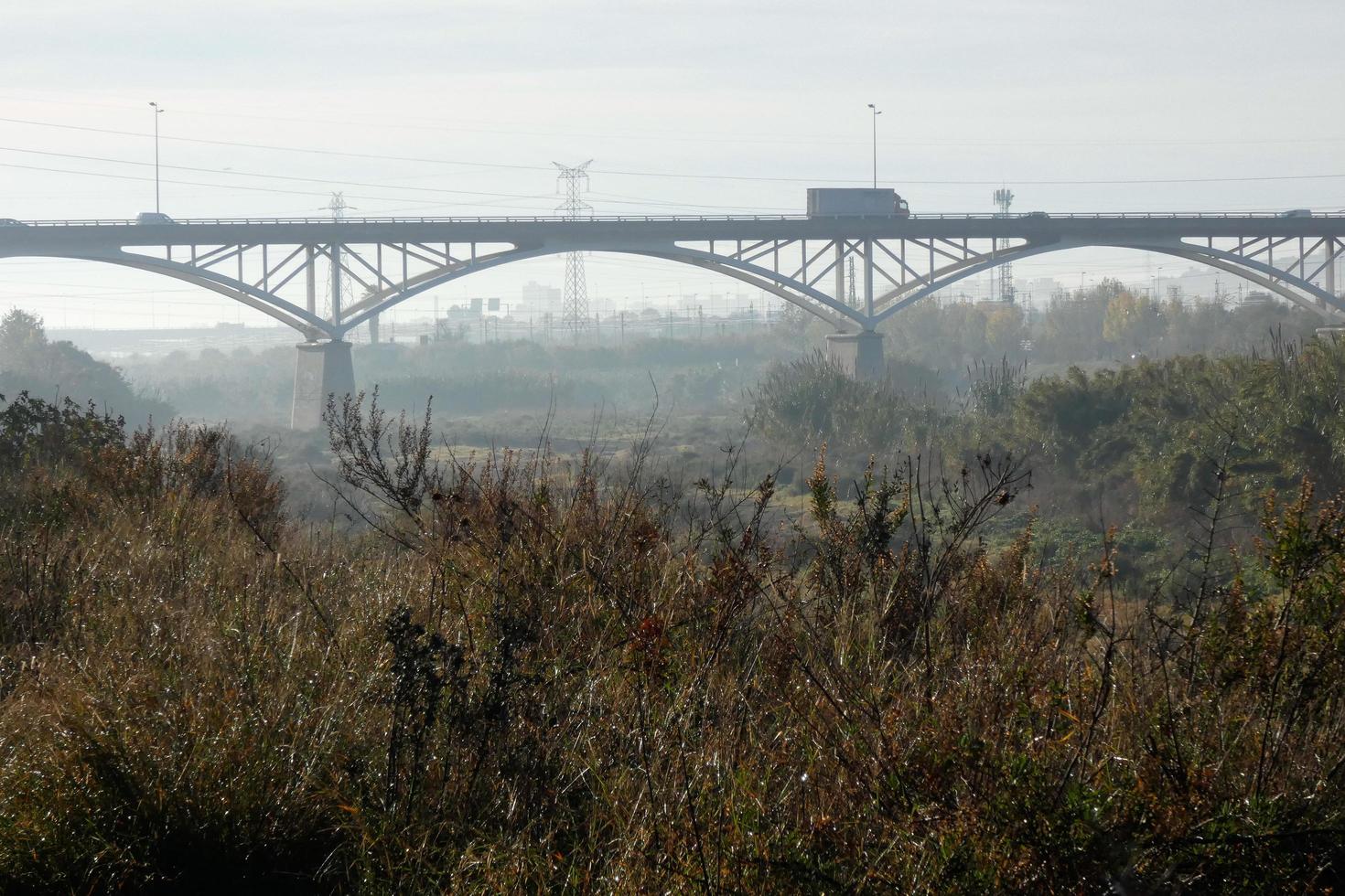 Modern bridge spanning a river, an engineering feat photo