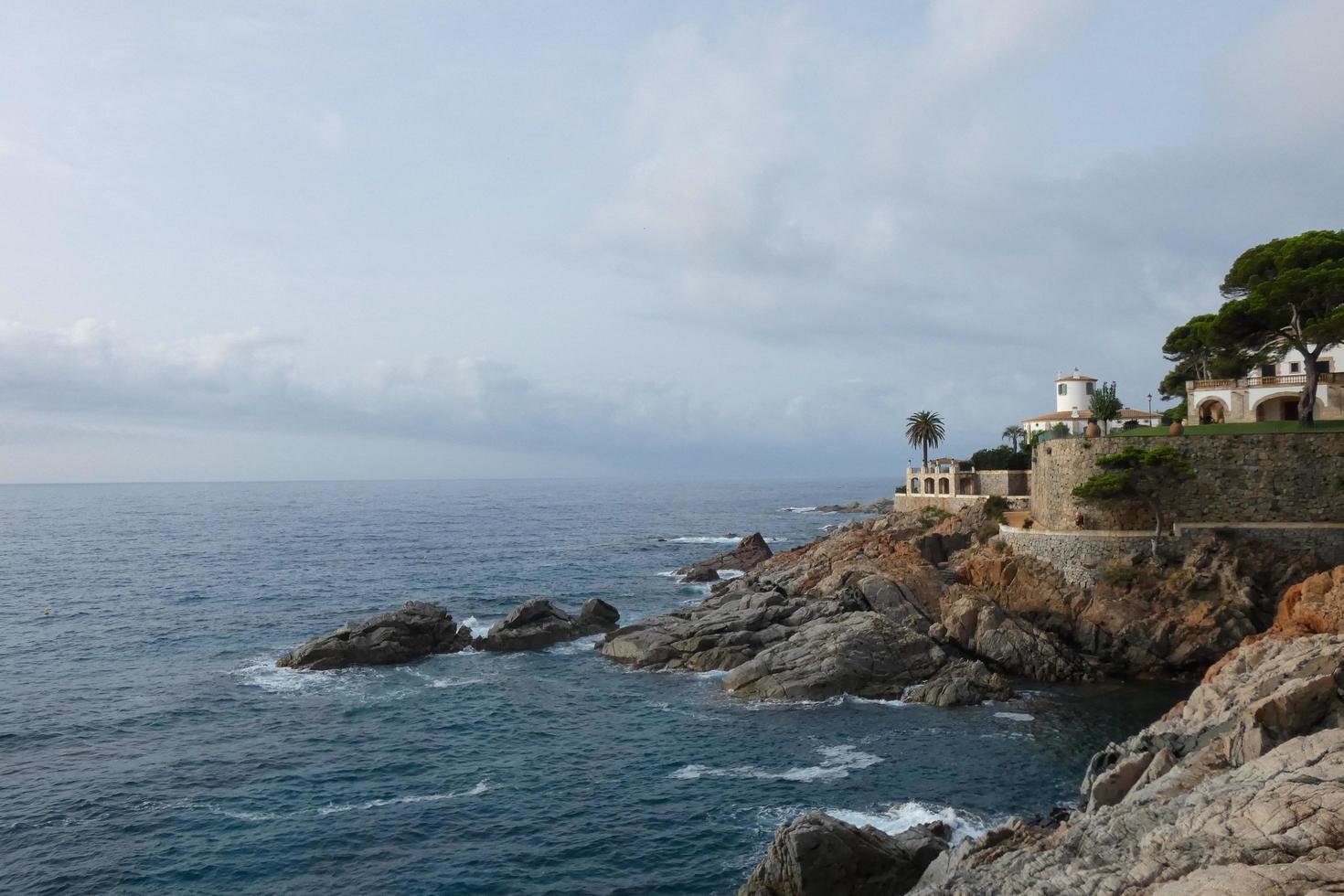 Costa brava and coastal path along the rugged coastline of northern catalonia, Spain photo