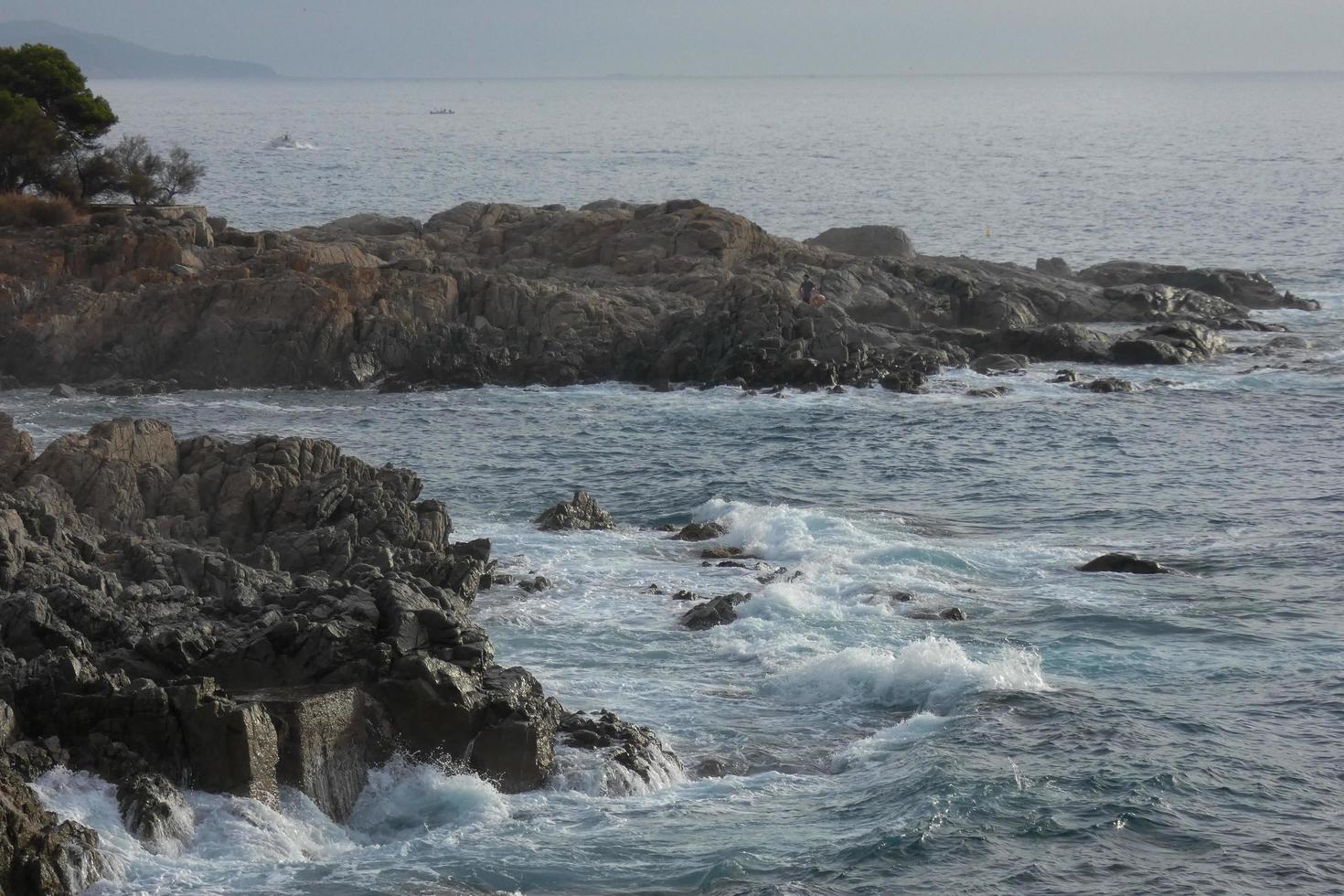 Costa brava and coastal path along the rugged coastline of northern catalonia, Spain photo