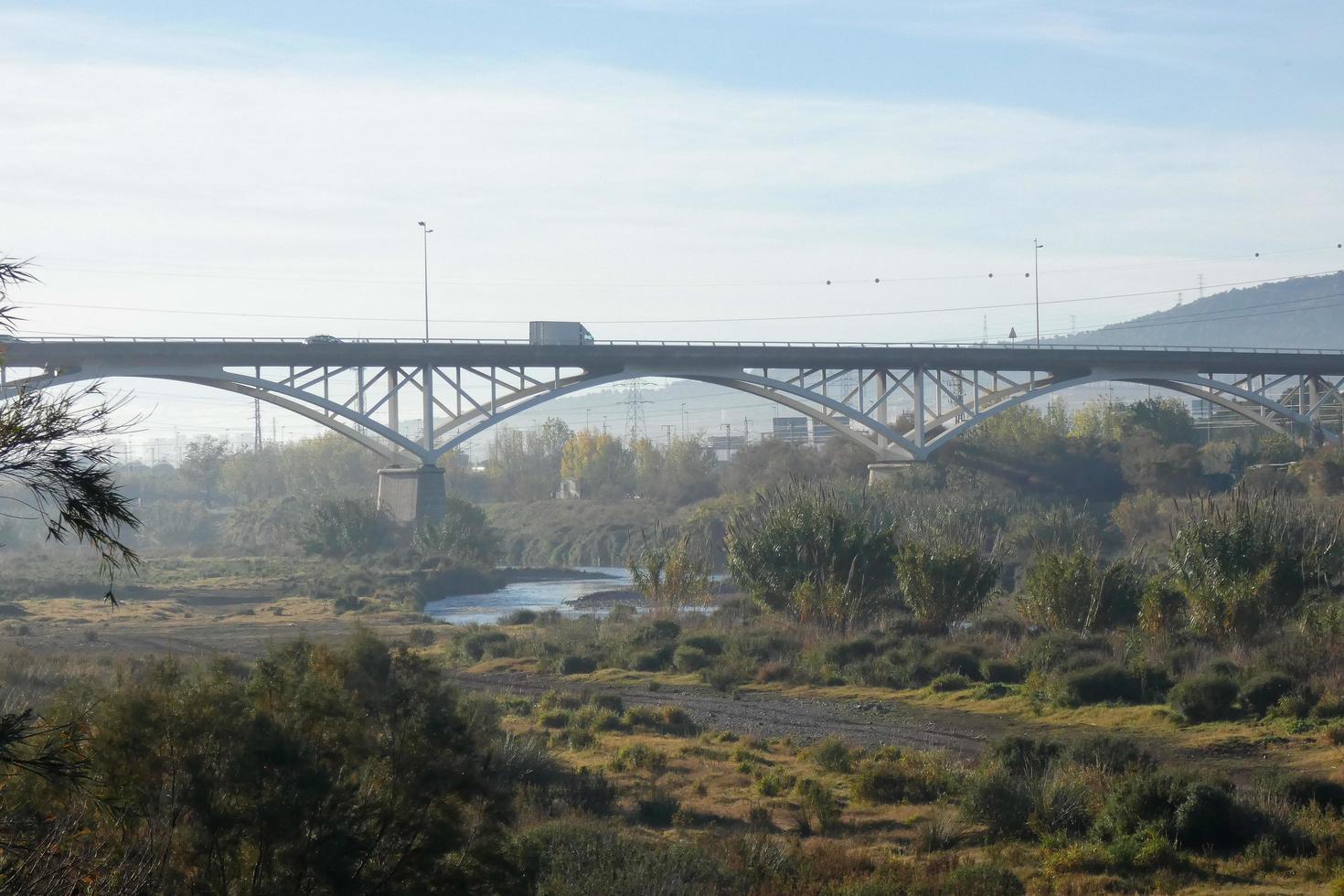 Modern bridge spanning a river, an engineering feat photo