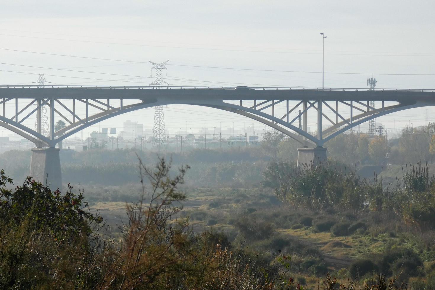 Modern bridge spanning a river, an engineering feat photo