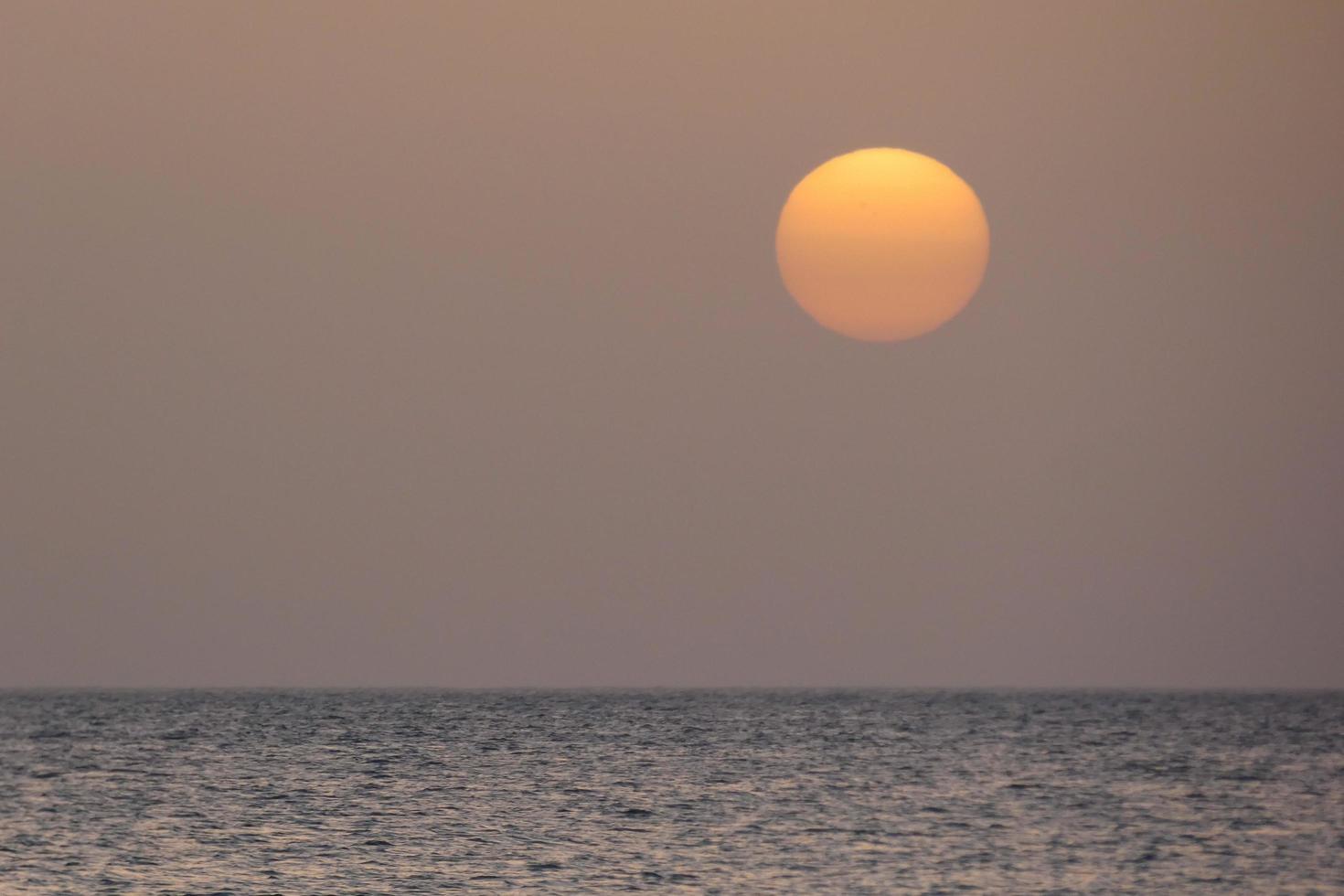 sunset and sunset on the sea photo