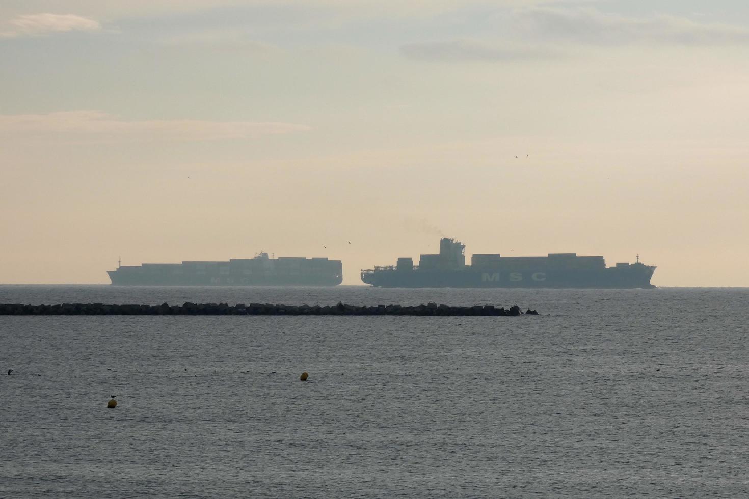 Cargo ships entering or leaving the port photo