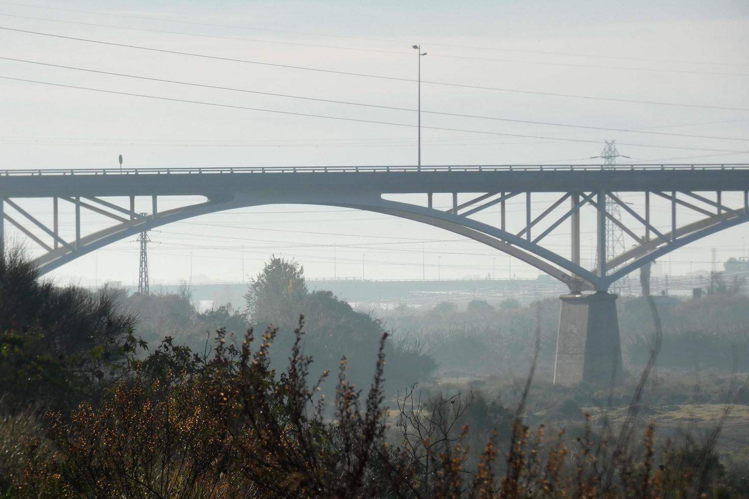 Modern bridge spanning a river, an engineering feat photo