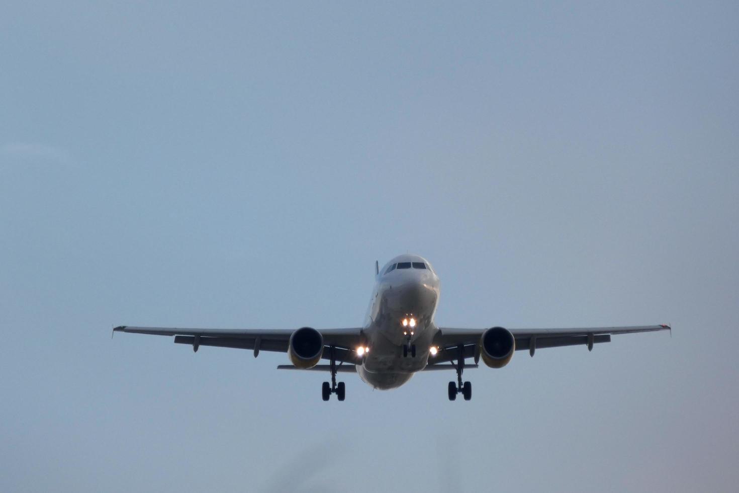 aircraft taking off from or landing at an airport photo