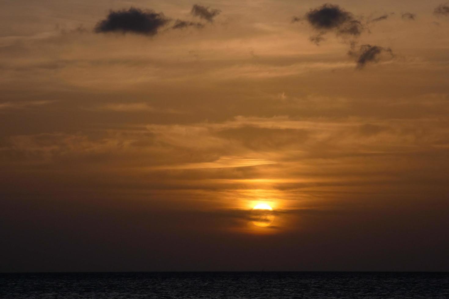 sun the sun, at sunset at the end of the day, essential for the life of the planet photo