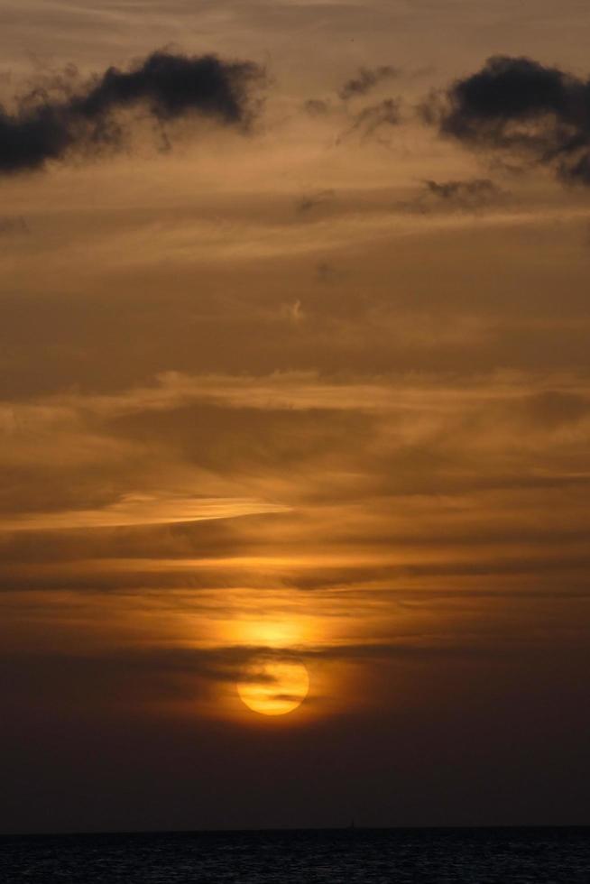 sun the sun, at sunset at the end of the day, essential for the life of the planet photo