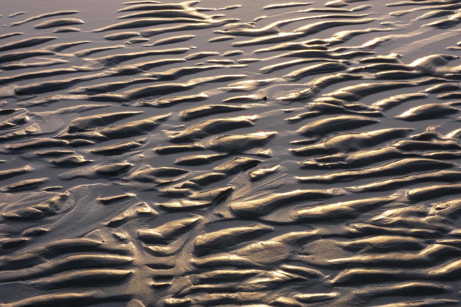 lonely, uncrowded beach with calm sea and small waves photo
